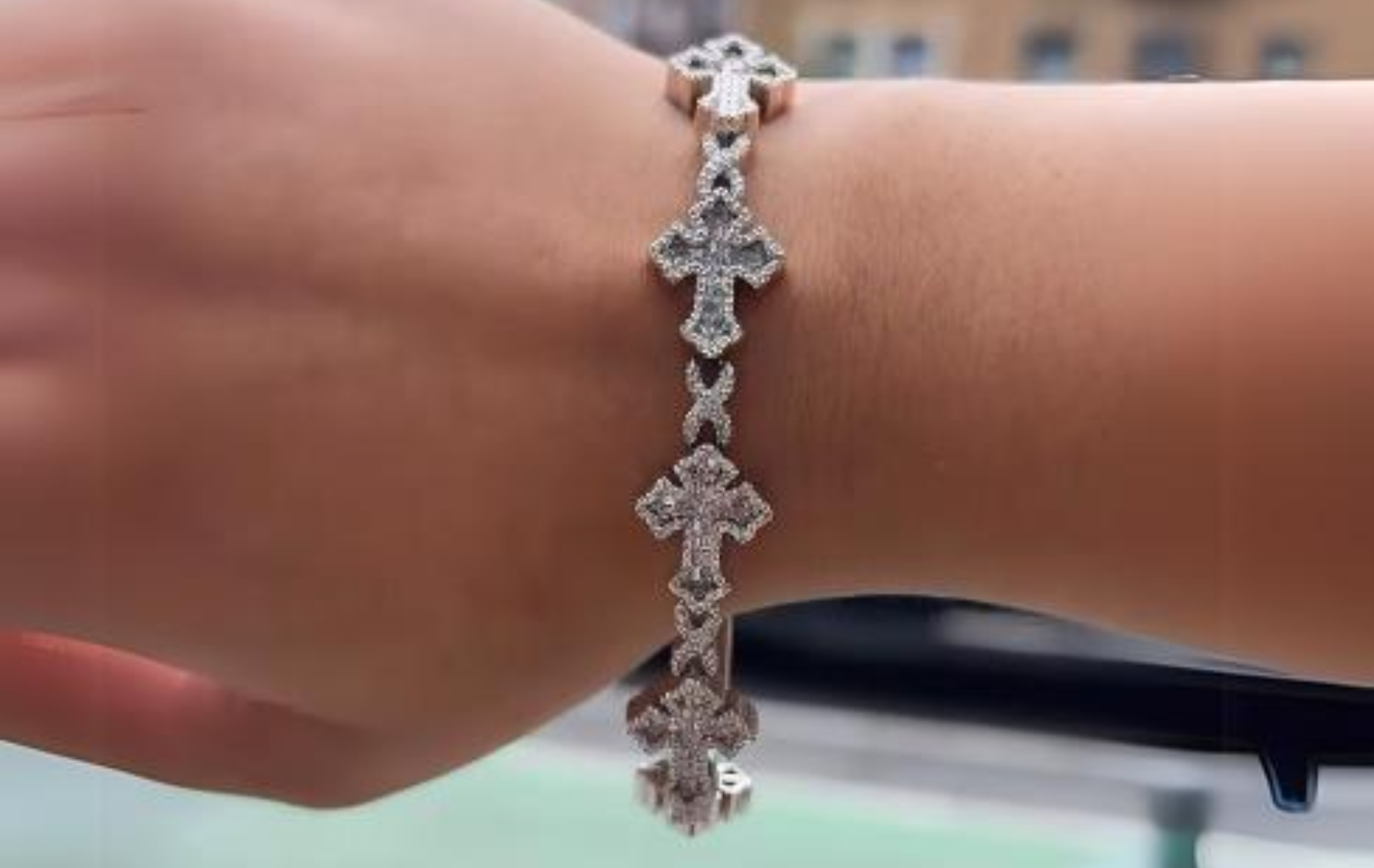 Elevate Your Style with the Oscar Stone White Gold Infinity Cross Bracelet